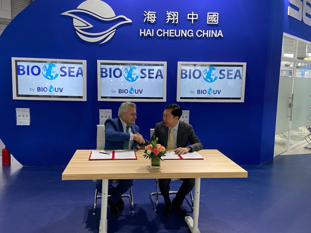 Benoit Gillmann, CEO and founder of BIO-UV Group (left) and Randolph Zhang, President, Hai Cheung Trading, sign a partnership agreement