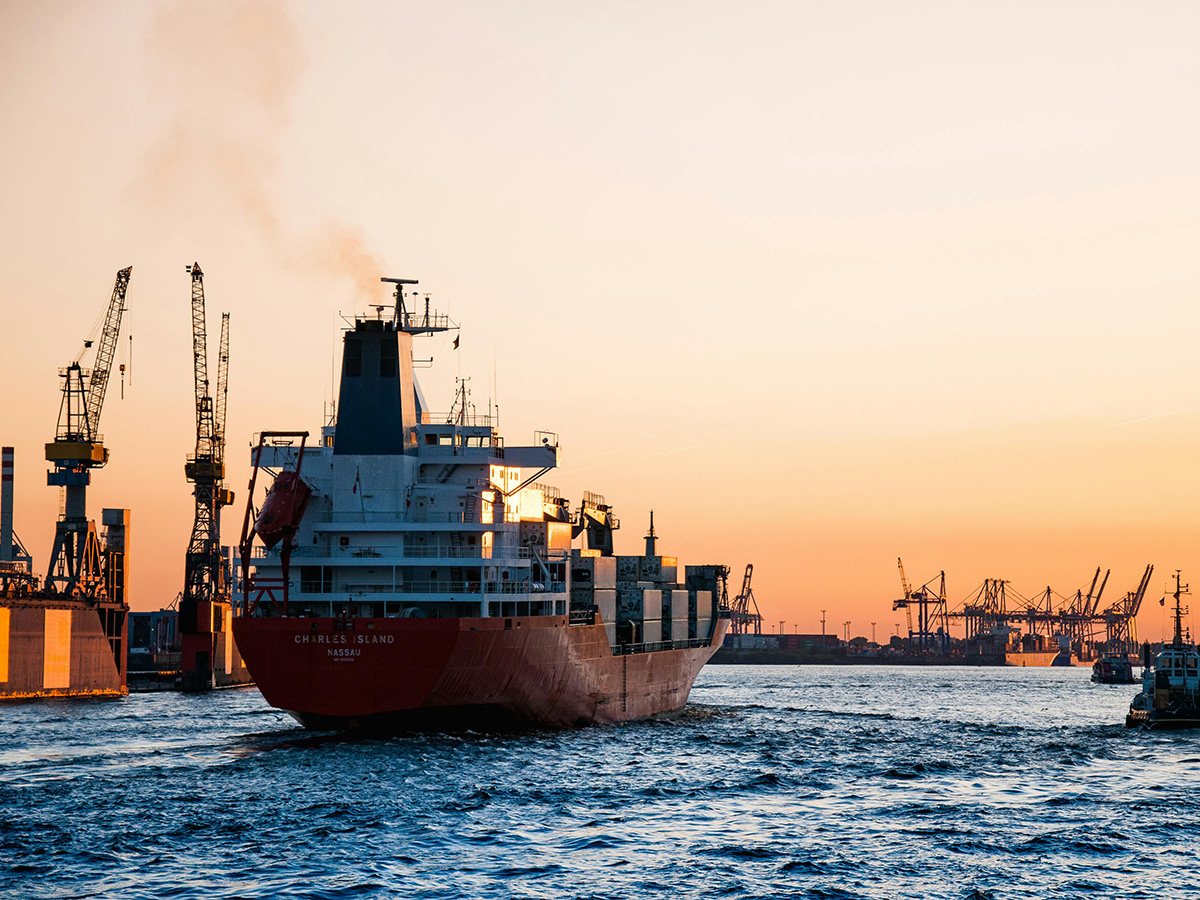 A ship sailing in dawn