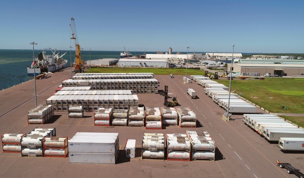 Specialized juice-carrying containers join other cargo containers and trailers at a busy dockside yard at Port Manatee, which has set numerous records in the first half of its fiscal year.