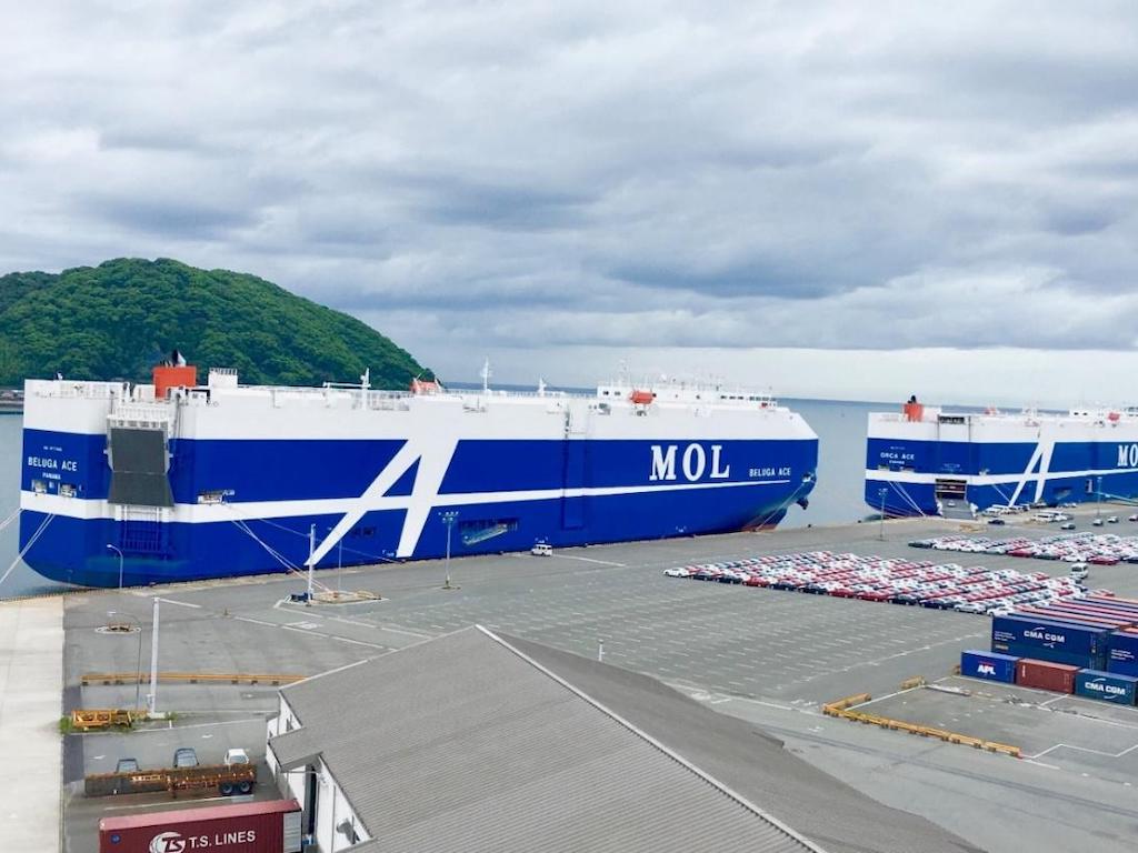 Car carriers (two Flexie series vessels) in berth for cargo handling operation