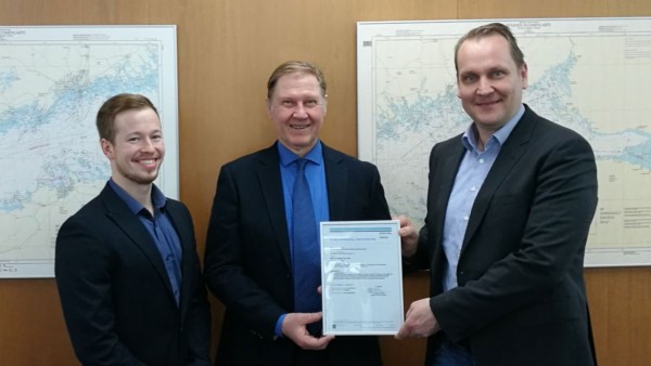 Seppo Liukkonen, Principal Surveyor, DNV GL (centre), presenting the first-ever type approval design certificate for onboard wind propulsion system, to Jarkko Väinämö, Norsepower CTO (right), and Otto Valkeisenmäki, Norsepower Certification Engineer (left).