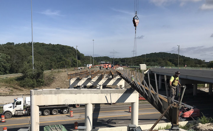 Crews replace the bridge superstructure on Interstate 77 over U.S. 36 in Newcomerstown, Ohio, in October 2020. Woolpert provided roadway and bridge design for the project, which supported Ohio Department of Transportation District 11-New Philadelphia. Photo courtesy of ODOT and Woolpert